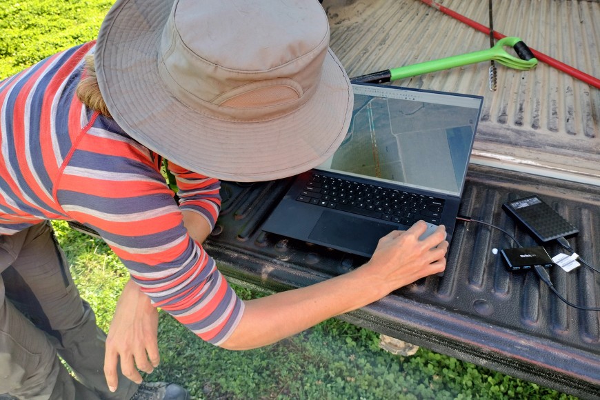 Figure 5. Manaaki Whenua – Landcare Research pedologist Kirstin Deuss analysing real-time data while in the field in order to best position the next soil pit. (Photo: Pierre Roudier)