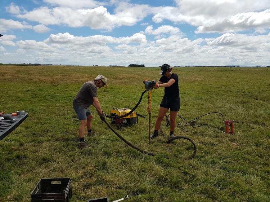 Figure 3: Imogen Doyle and Ian Fuller coring a former channel of the Oreti River, February 2022