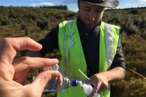 Figure 3. Preparing salmon DNA solution to help monitor potential contamination within the peat core.