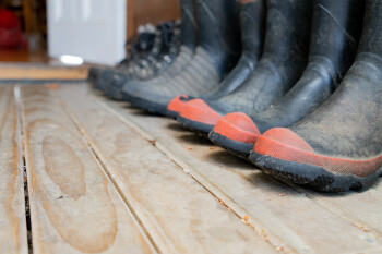 Image of gumboots on a veranda