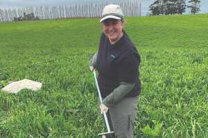 Dr Kara Allen collecting topsoil samples