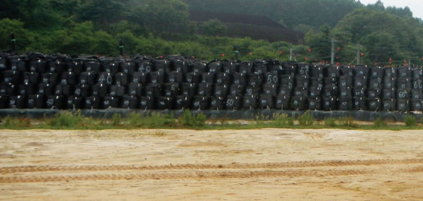 Contaminated soil in storage following decontamination (removal of topsoil)