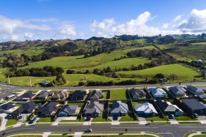 Urban development encroaching on productive land in Pōkeno, Waikato.