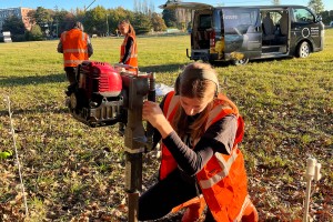 Katie O’Hagan, an honours student at the University of Canterbury, taking a soil core at the Manaaki Whenua site in Lincoln