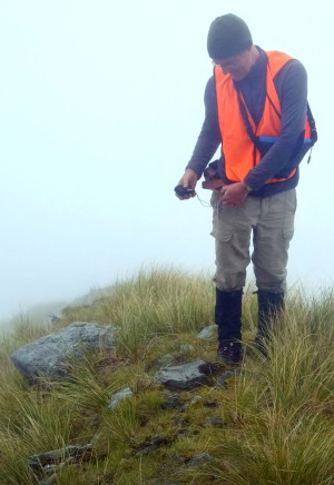 Isaac Larsen (University of Massachusetts- Amherst) on one of the narrow tussock ridges, just before digging a soil pit.