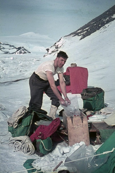 Dr Iain Campbell packing samples at Edisto Inlet during a 1964 expedition to Antarctica.