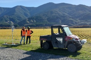 Marlborough District Council environmental science technician Zeke Hoskins (right) and Manaaki Whenua – Landcare Research technician Kishor Kumar (left) standing next to the mobile soil-sensing platform.