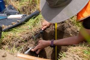 MWLR pedologist Kirstin Deuss collects a field sample for soil description, following procedures laid out in the Soil Description Handbook.