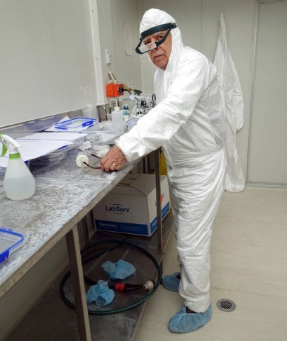 Dr Hernan Norambuena in the containment facility