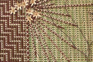 Painted kākaho held together by kiekie in tukutuku panel, Te Aitanga ā Tāne, created by Mae Taurua. In Allan Herbarium, Manaaki Whenua, Lincoln. Image: Sue Scheele